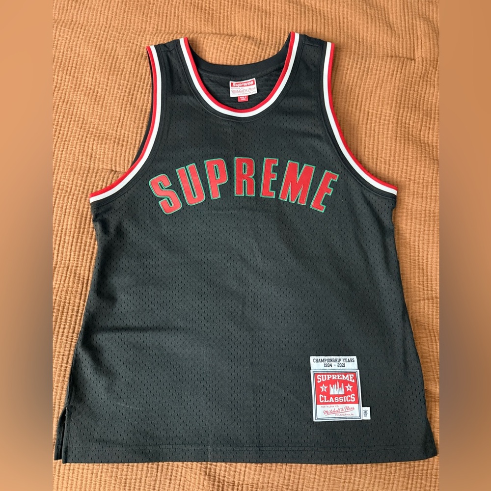 Supreme x Mitchell & Ness Basketball Jersey
Black Mesh Tank w Red & Green Logo